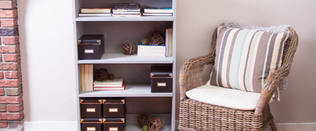 Bookshelf with stationary boxes and other paper goods