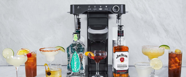 bev by BLACK+DECKER sitting on a marble bar with a variety of drinks