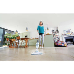 Steam Mop with Lift + Reach Head being used for cleaning floor.