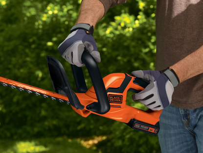 up close shot of BLACK+DECKER hedge trimmer, cordless
