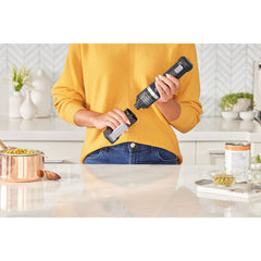 Lever pulled fully down on the can opener attachment of the BLACK+DECKER kitchen wand system