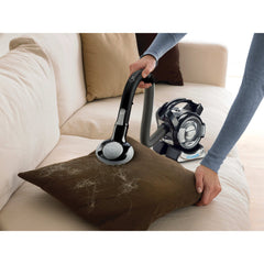 Profile of dustbuster flex cordless hand vacuum with floor head and pet hair brush.
