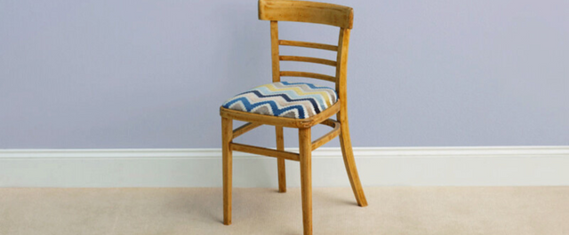 Wooden chair with colorful seat cushion
