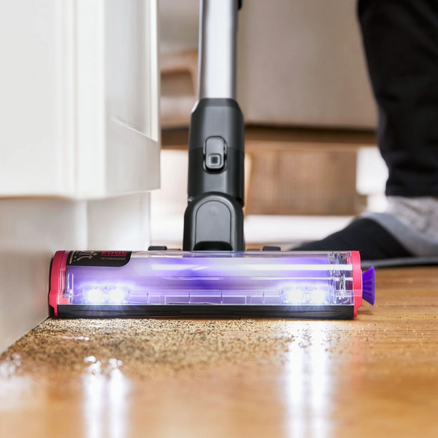 Summit series stick vac on wooden floor