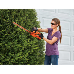 Profile of 20 volt 18 inch cordless hedge trimmer.