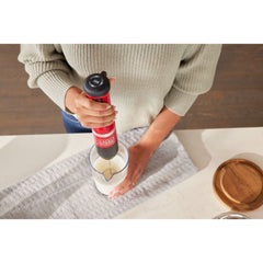Front view of the BLACK+DECKER kitchen wand(TM) milk frother attachment